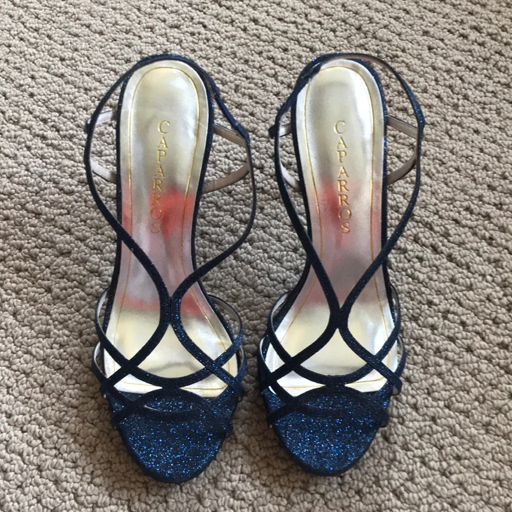 Caparros glitz heals never worn